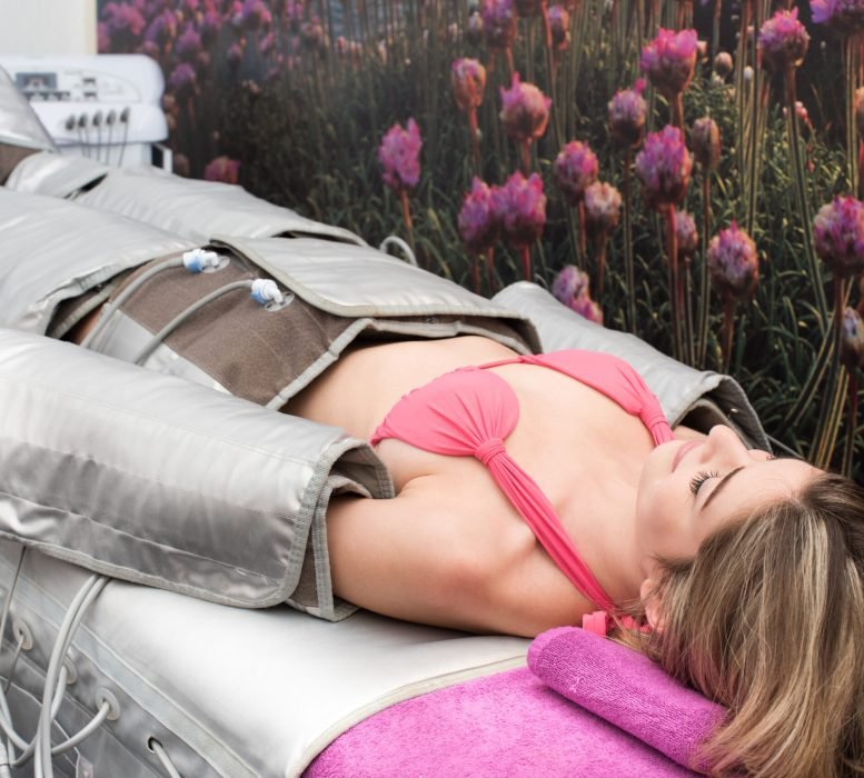 Woman doing cosmetic procedures in spa clinic